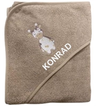 Badeslag med navn med Ko fra Nørgaard Madsen. Badeslaget er Sandfarvet.